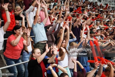 Participating in a Mexican Wave